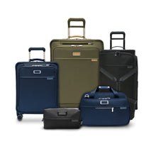 Load image into Gallery viewer, Briggs & Riley Baseline Expandable Cabin Bag 
Group shot image of 5 assorted Briggs & Riley items from the Baseline Collection shown in Navy, Olive and Black
Height	   Width	     Depth	    Weight
US	11 in.	17 in.	8 in.	        3 lbs.
EU	27.9 cm	43.2 cm	20.3 cm	1.4 kg