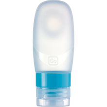 Load image into Gallery viewer, Front view of the transparent travel bottle with a blue cap ring.