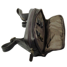 Load image into Gallery viewer, Side view of the brown leather waist pack with the front compartment unzipped.