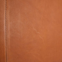 Load image into Gallery viewer, Close up to the tan leather on the front panel of the letter pad.