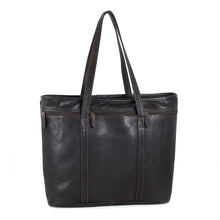 Load image into Gallery viewer, Front view of the brown leather tote bag with the shoulder straps pulled up.