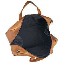 Load image into Gallery viewer, Interior view of the tan leather duffle bag. It features a black fabric lining.
