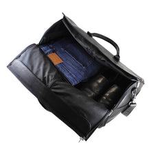 Load image into Gallery viewer, DayTrekr Leather Suiter Duffel - Black
Alternate Image of flat-packing space above the rolled garment sleeve compartment.   
Dimensions:  21"W x 12"H x 12"D
Weight:           4 lbs.