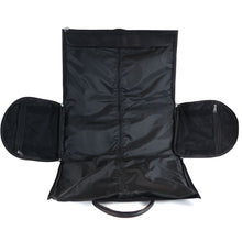 Load image into Gallery viewer, DayTrekr Leather Suiter Duffel - Black
Image of garment sleeve packed and zipped closed.  Leaving ample space for shoes, and flat-packed clothing in duffel portion of bag.
Dimensions:  21"W x 12"H x 12"D
Weight:           4 lbs.