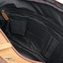 Load image into Gallery viewer, DayTrekr Leather 2-Section Laptop Brief - Tan
Closeup Image of business accessory organizer.  Full-length zip pocket for boarding pass, passport, or important documents.  Also includes pocket for smart phone, pens, and business cards.
Dimensions:  15 x 12 x 3.5"