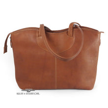Load image into Gallery viewer, Front view of the tan leather tote bag. The shoulder straps are resting across the top.