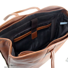 Load image into Gallery viewer, Interior view of the tan leather tote bag. It features dedicated compartments for a tablet and a laptop.