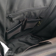 Load image into Gallery viewer, Interior view of the brown leather laptop backpack. A zipper-closing pocket organization compartments are available.