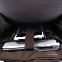 Load image into Gallery viewer, Interior view off the backpack with a laptop and tablet arranged in the back panel compartments.
