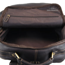 Load image into Gallery viewer, Interior view of the backpack. A zipper-closing compartment is in the interior front panel.