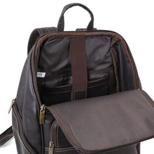 Load image into Gallery viewer, Interior view of the leather backpack's main compartment. It features a laptop and tablet set of pockets.