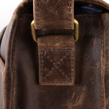 Load image into Gallery viewer, DayTrekr Distressed Leather Laptop Messenger Bag - Brown
Closeup Image of stitching detail and antique brass hardware.
Dimensions:  16.75"W X 12.5"H x 4"D
