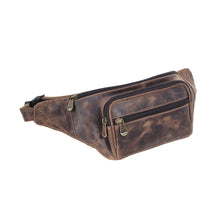 Load image into Gallery viewer, Angled front view of the distressed brown leather fanny pack with vintage brass zipper pulls.
