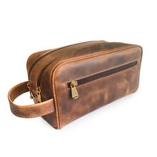 Load image into Gallery viewer, Angled front view of the brown leather distressed leather shaving kit and toiletry bag.