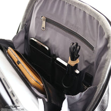 Load image into Gallery viewer, DayTrekr Leather Multi-Pocket Slim Backpack - Black
Image of opposite interior wall of laptop/tablet compartment showing zippered accessory pocket as well as business accessory organizer for your smart phone, power bank, cables and keys.
Dimensions:  16 x 12 x 4.5" (Measurement at base, gradually tapers at top)