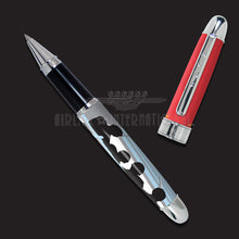 Load image into Gallery viewer, View of the rollerball pen with the cap placed on the side. Set on a gray background.