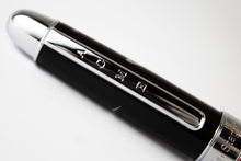 Load image into Gallery viewer, Close up to the cap on the pen. The engraving reads. ACME.