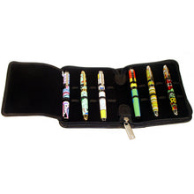 Load image into Gallery viewer, Angled view of the pen case opened with six pens in the slots. (Pens not included).