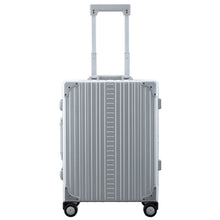 Load image into Gallery viewer, Front view of the suitcase with the handle pulled up. Placed on a white background.