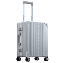 Load image into Gallery viewer, Angled view of the suitcase's front with the handle stretched up. Placed on a white background.