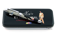 Load image into Gallery viewer, Top view of the pen case with the rollerball placed on top. Set on a white background. The lid of the case is black with a print that reads ELVIS PRESLEY LIMITED EDITION PEN, with a photo of Elvis to the right. The ACME logo is at the bottom. 
The pen is a white in color with chrome trims, and a silhouette design of Elvis singing on the barrel.