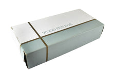 Load image into Gallery viewer, Angled view of the outer cardboard box. Set on a white background.