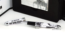 Load image into Gallery viewer, The pen has a white background with chrome trims, the cap reads "THE BEATLES REVOLVER" in black letters. The barrel has the drawn art of each member seen on the original cover.
