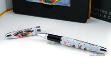 Load image into Gallery viewer, Close up to the Magical Mystery Tour pen with the cap placed behind it. Set on a white background.