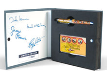 Load image into Gallery viewer, View of the presentation box. The inside of the cover features a print of each signature from the Beatles along with the Edition Number of the Set. The right side has the slots for the pen and the card case. Set on a white background.