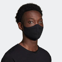 Load image into Gallery viewer, Adidas Face Mask: Angled view of a model wearing the mask.