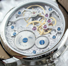 Load image into Gallery viewer, Back view of the watch. The engravings on this side read: ALL STAINLESS STEEL, 931-2