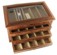 Load image into Gallery viewer, Angled top view of the chest with the drawers slightly pulled. Set on a white background.