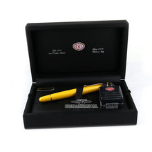 Load image into Gallery viewer, Arrangement of the pen and ink bottle in the black presentation box. Set on a white background.