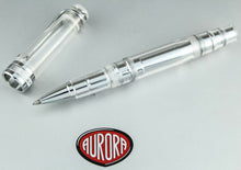 Load image into Gallery viewer, Arrangement of the rollerball pen with the cap placed next to it. Placed on top of the presentation box.