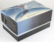 Load image into Gallery viewer, Angled view of the outer box included. Placed on a white background.