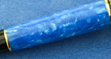 Load image into Gallery viewer, Close up to the engraving on the pen barrel. It features the Aurora Italia logo, and some writing in Italian.