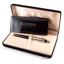 Load image into Gallery viewer, Arrangement of the pen in the presentation box with the booklet. Set on a white background.