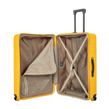 Load image into Gallery viewer, Interior view of the mango yellow suitcase. The front panel features a zipper-closing compartment shown partway opened, and the back panel features a set of straps to hold contents in place.