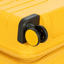 Load image into Gallery viewer, Close up to a spinner wheel of the mango yellow suitcase.