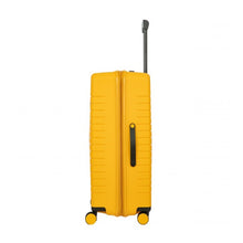 Load image into Gallery viewer, Side view of the mango yellow hard shell suitcase with black trims. A black handle is attached for easy grabbing.