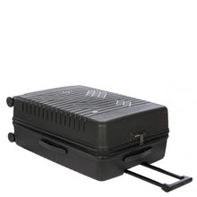 Load image into Gallery viewer, A matte, hard-shell black suitcase with a textured wave pattern is laid on its back. The top of it features a three-digit combination lock and a handle.