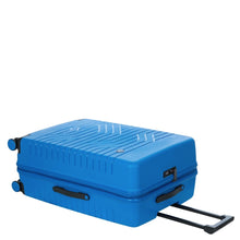 Load image into Gallery viewer, View of the 30 inch electric blue suitcase laid on its back on a white background.