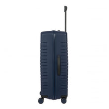 Load image into Gallery viewer, Side view of the ocean blue hard shell suitcase with black trims. The side has a black handle for easy grabbing. The telescopic handle is partly pulled.