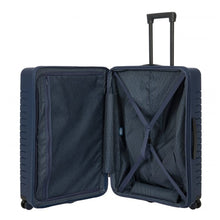 Load image into Gallery viewer, Interior view of the 30-inch Ocean Blue Expandable Suitcase. The front panel has a zipper-closing compartment, and the back panel has a set of straps to hold contents.