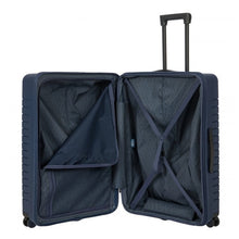 Load image into Gallery viewer, Interior view of the 30-inch Ocean Blue Expandable Suitcase. The front panel has a zipper-closing compartment (shown partly opened), and the back panel has a set of straps to hold contents.