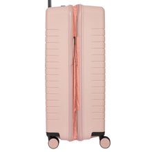Load image into Gallery viewer, Side view of the hard-shell pink suitcase. The expandable feature is zipped open.