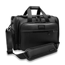 Load image into Gallery viewer, Briggs & Riley Baseline Underseat Duffle - Black
Image of Angled Front Panel View shown with adjustable shoulder strap
Height	     Width	     Depth	    Weight
US	10.5 in.	16.5 in.	11.5 in.	2.8 lbs.
EU	26.7 cm	41.9 cm	29.2 cm	1.3 kg