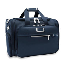 Load image into Gallery viewer, Briggs & Riley Baseline Underseat Duffle - Navy
Image of Angled Front Panel View
Height	     Width	     Depth	    Weight
US	10.5 in.	16.5 in.	11.5 in.	2.8 lbs.
EU	26.7 cm	41.9 cm	29.2 cm	1.3 kg