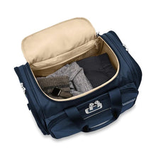 Load image into Gallery viewer, Briggs & Riley Baseline Underseat Duffle - Navy
Image of Angled Front Panel View with main compartment zipped open to show spacious packing capability.
Height	     Width	     Depth	    Weight
US	10.5 in.	16.5 in.	11.5 in.	2.8 lbs.
EU	26.7 cm	41.9 cm	29.2 cm	1.3 kg