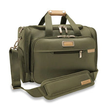 Load image into Gallery viewer, Briggs & Riley Baseline Underseat Duffle - Olive
Image of Angled Front Panel View with adjustable shoulder strap
Height	     Width	     Depth	    Weight
US	10.5 in.	16.5 in.	11.5 in.	2.8 lbs.
EU	26.7 cm	41.9 cm	29.2 cm	1.3 kg
